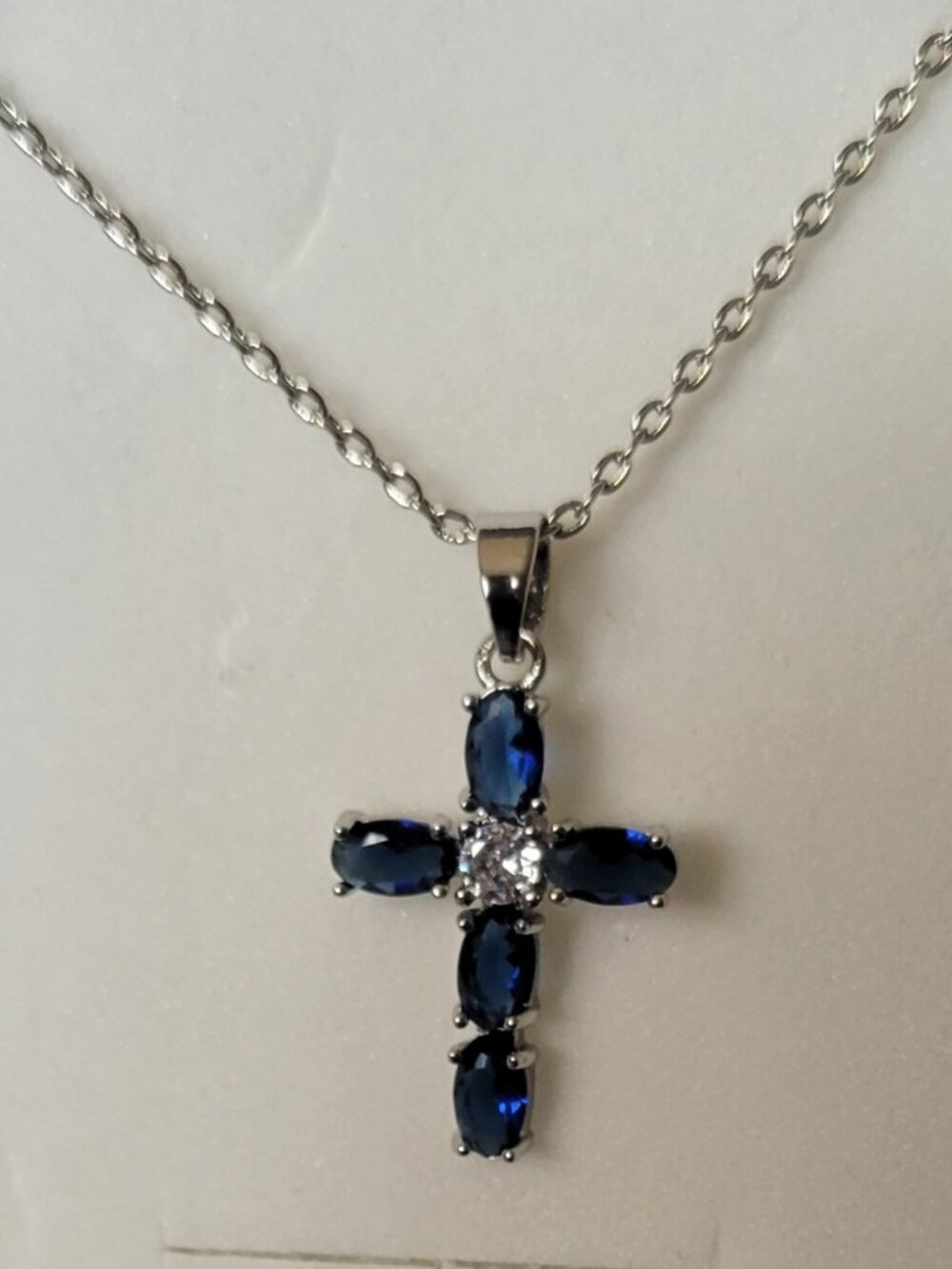 Blue and Clear Rhinstone Cross on Silver Chain
